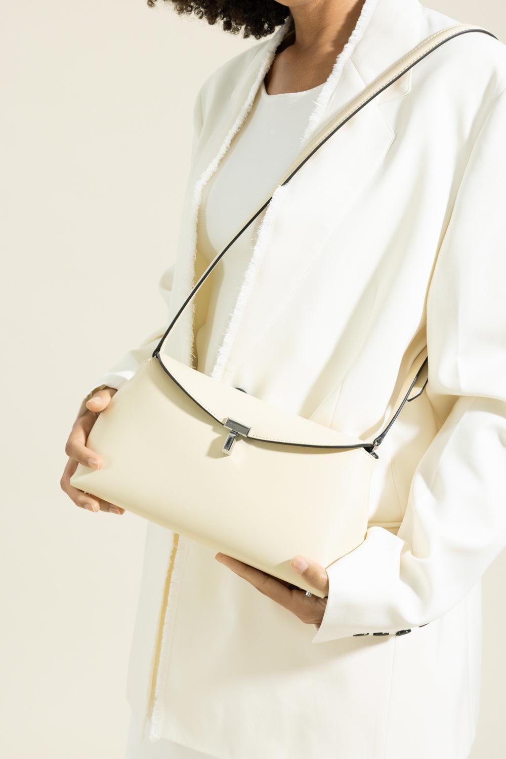T-Lock Leather Clutch - Champagne-CREAM-HANDBAGCLUTCHES-TOTEME
