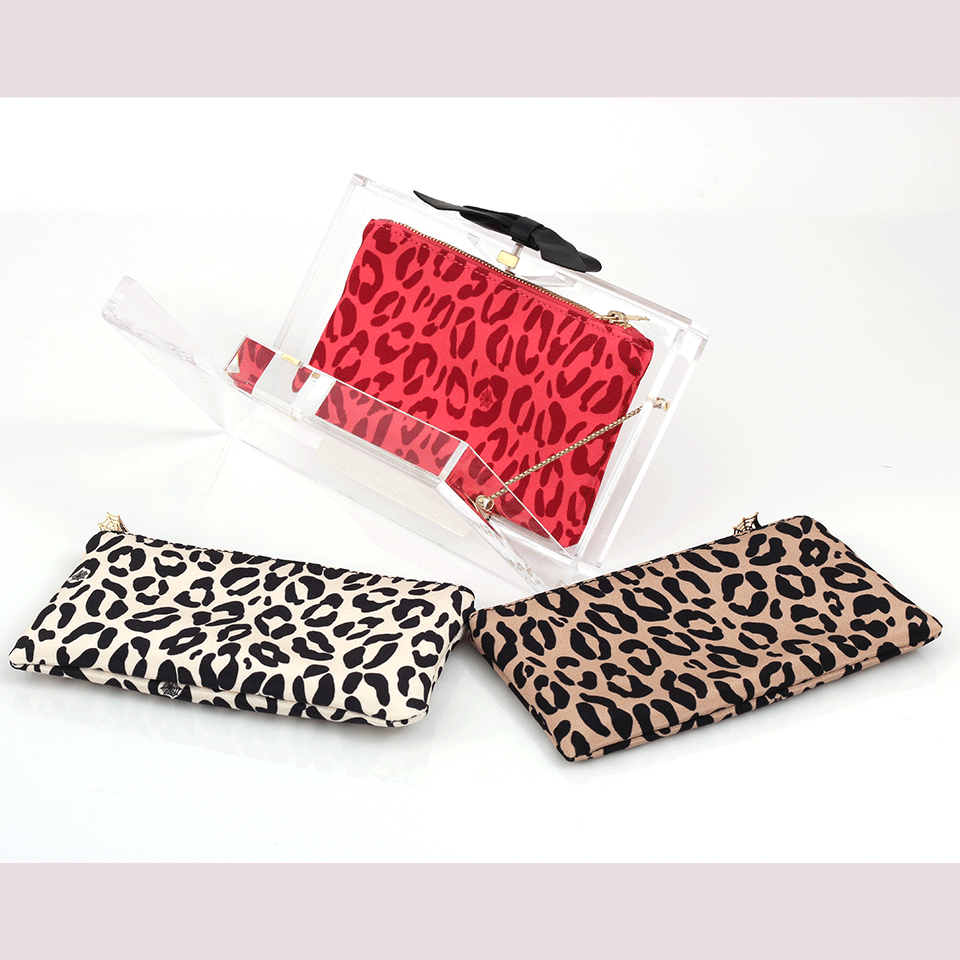 CHARLOTTE OLYMPIA-Bow Clasp Clutch-TRANS