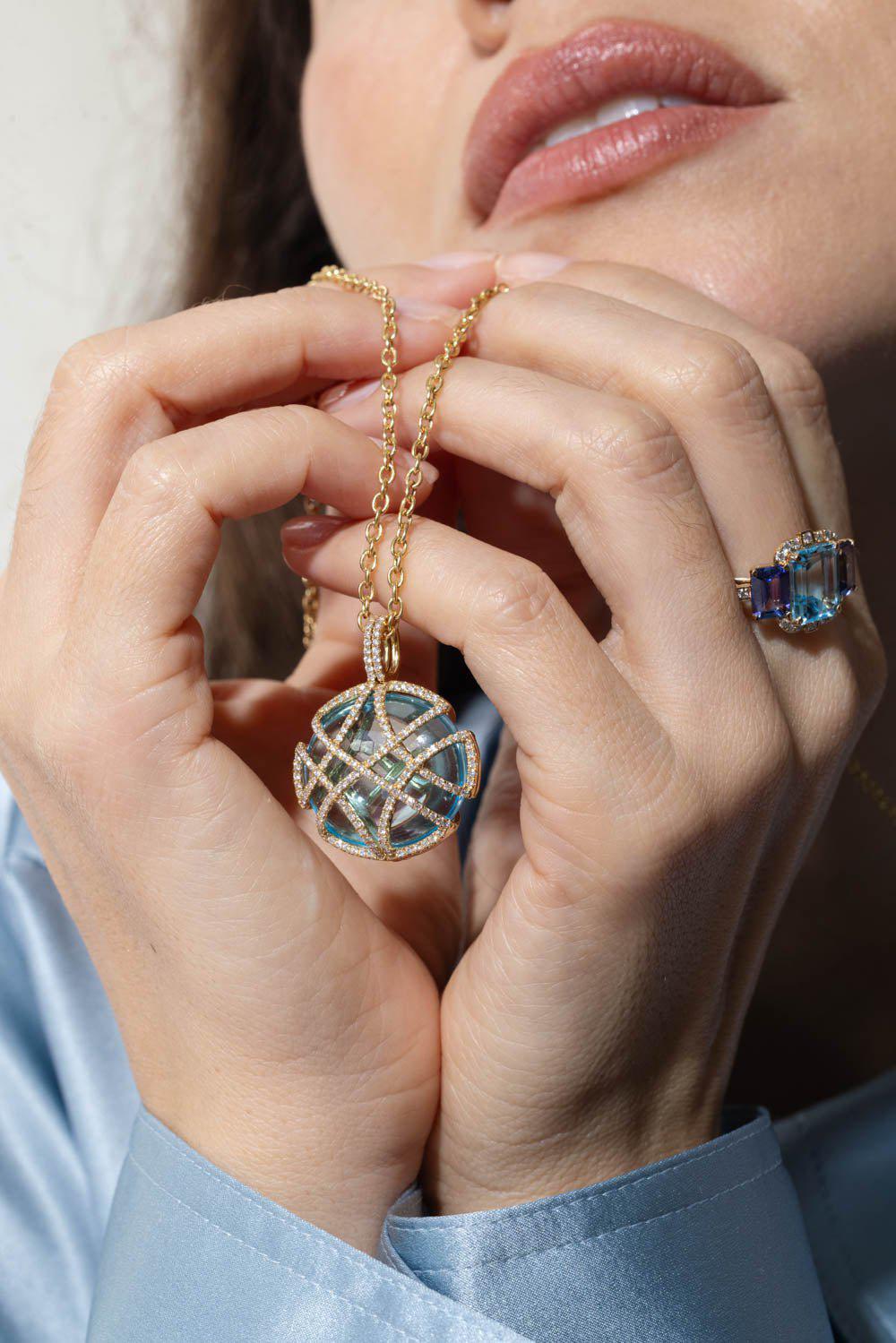 GOSHWARA-Blue Topaz Oval Disc-
